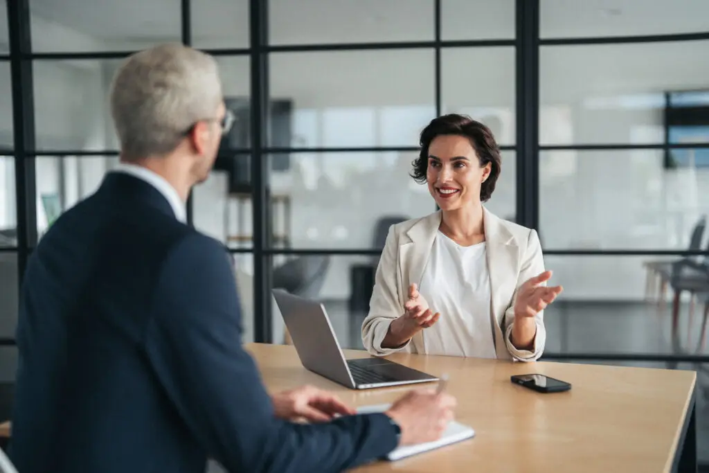 insight driven business dialogue. confident businesswoman engaging in professional discussion